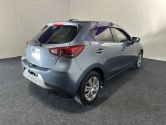 Photo of the vehicle Mazda Demio