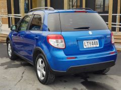 Photo of the vehicle Suzuki SX4