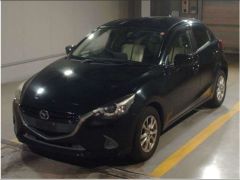 Photo of the vehicle Mazda Demio