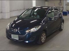 Photo of the vehicle Mazda Demio