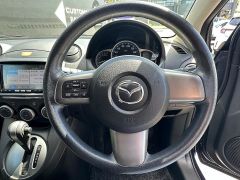 Photo of the vehicle Mazda Demio