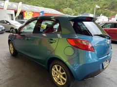 Photo of the vehicle Mazda Demio