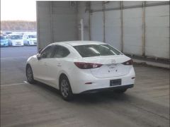 Photo of the vehicle Mazda Axela