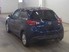 Photo of the vehicle Mazda Demio