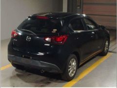 Photo of the vehicle Mazda Demio