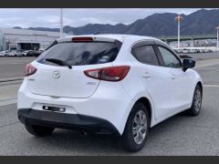 Photo of the vehicle Mazda Demio