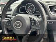 Photo of the vehicle Mazda Axela