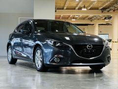 Photo of the vehicle Mazda Axela