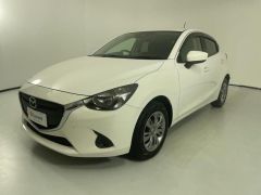 Photo of the vehicle Mazda Demio