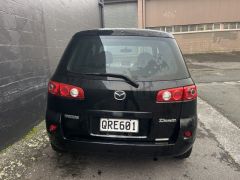 Photo of the vehicle Mazda Demio