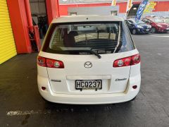 Photo of the vehicle Mazda Demio