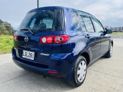 Photo of the vehicle Mazda Demio