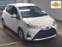 Photo of the vehicle Toyota Vitz