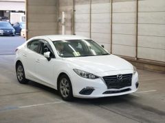 Photo of the vehicle Mazda Axela