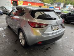 Photo of the vehicle Mazda Axela