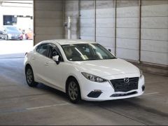 Photo of the vehicle Mazda Axela