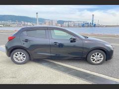 Photo of the vehicle Mazda Demio