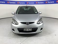 Photo of the vehicle Mazda Demio