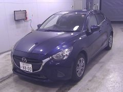 Photo of the vehicle Mazda Demio