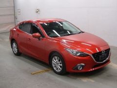 Photo of the vehicle Mazda Axela