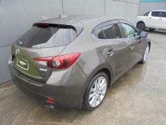 Photo of the vehicle Mazda Axela