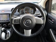 Photo of the vehicle Mazda Demio