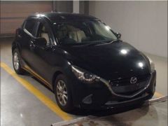 Photo of the vehicle Mazda Demio