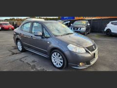 Photo of the vehicle Suzuki SX4