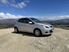 Photo of the vehicle Mazda Demio