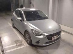 Photo of the vehicle Mazda Demio