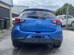 Photo of the vehicle Mazda Demio