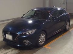 Photo of the vehicle Mazda Axela