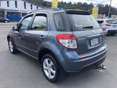 Photo of the vehicle Suzuki SX4