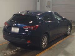 Photo of the vehicle Mazda Axela