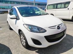 Photo of the vehicle Mazda Demio