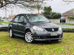 Photo of the vehicle Suzuki SX4