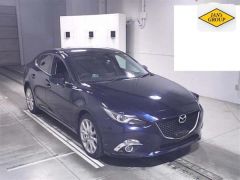 Photo of the vehicle Mazda Axela