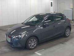 Photo of the vehicle Mazda Demio