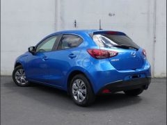 Photo of the vehicle Mazda Demio