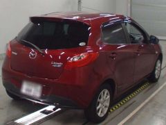 Photo of the vehicle Mazda Demio