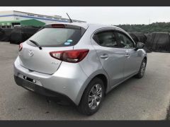 Photo of the vehicle Mazda Demio