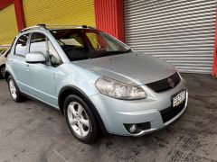 Photo of the vehicle Suzuki SX4