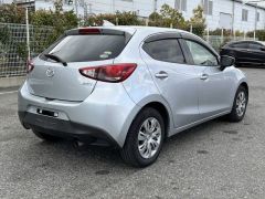 Photo of the vehicle Mazda Demio