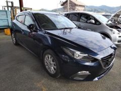 Photo of the vehicle Mazda Axela