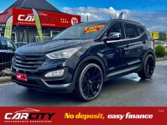 Photo of the vehicle Hyundai Santa Fe