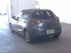 Photo of the vehicle Mazda Demio