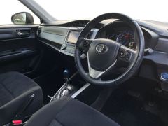 Photo of the vehicle Toyota Corolla