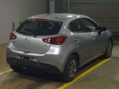 Photo of the vehicle Mazda Demio