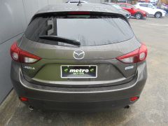 Photo of the vehicle Mazda Axela