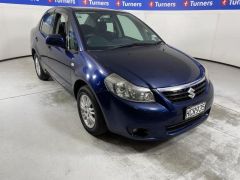 Photo of the vehicle Suzuki SX4